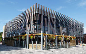 front of Jack Astor's restaurant with the patio at TD Place