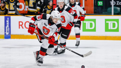 67s players on the ice playing at TD Place, Ottawa